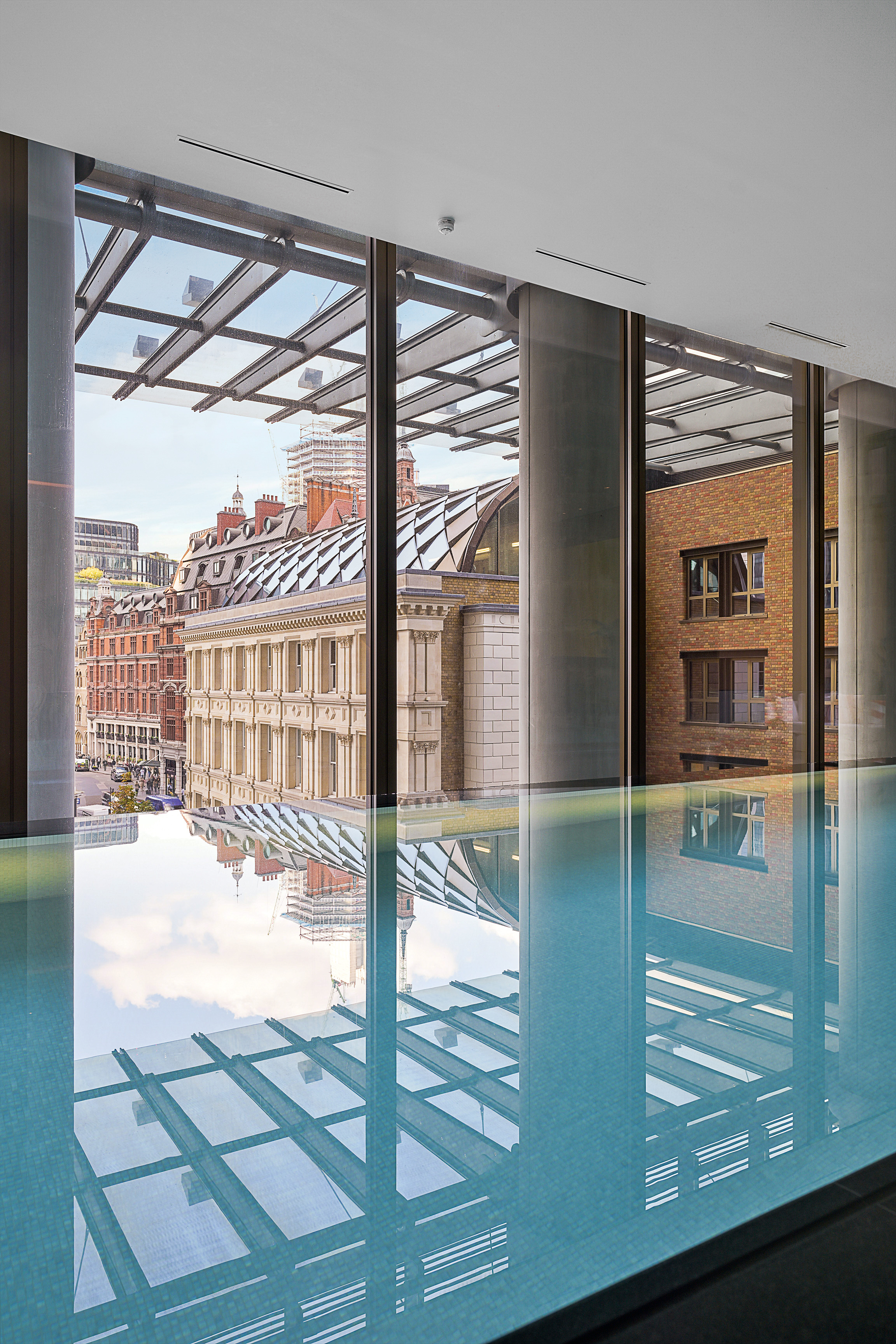 The heated 18.5-metre infinity pool with views across the City